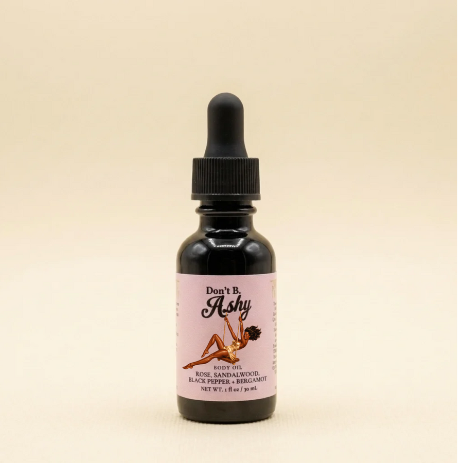 Rose + Sandalwood body oil bottle