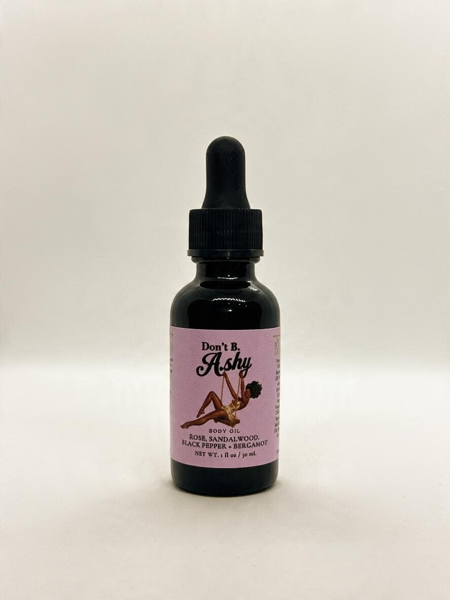 Rose + Sandalwood body oil bottle