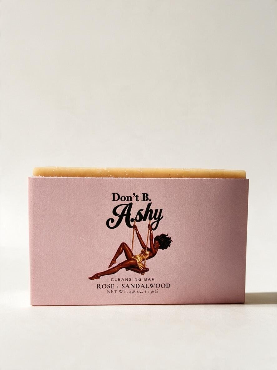 Rose + Sandalwood cleansing bar in its pink sleeve